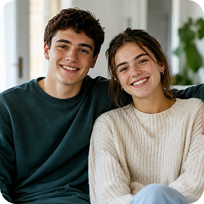 A Brother & Sister: Brother and sister smiling at home